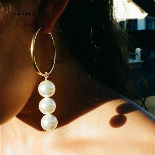 Chu y khi deo khuyen tai phong thuy