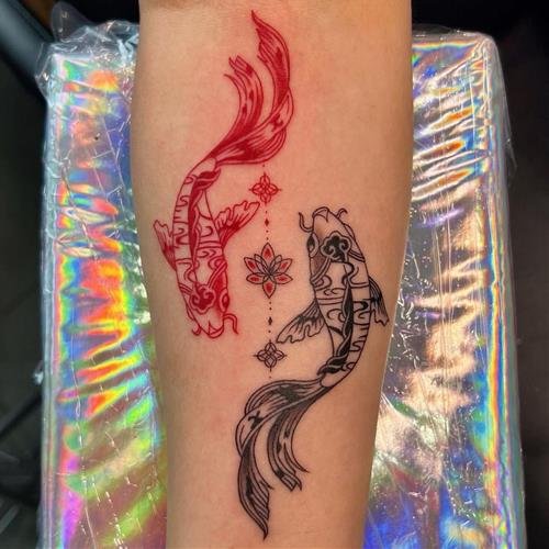 Hình xăm 2 chú cá âm dương Hinh xam 2 chu ca am duong